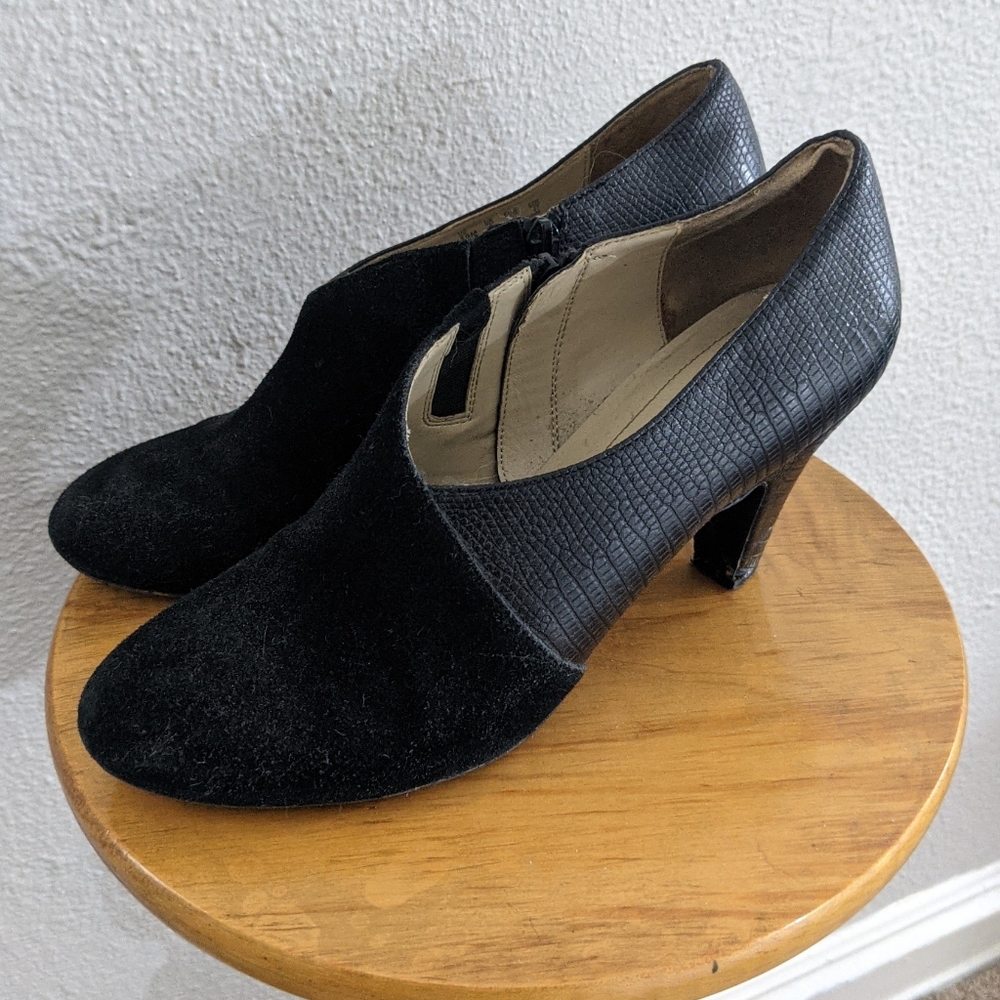 Black asymmetrical booties